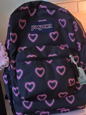 heart jansport backpack Big Student The embroidered butterfly detail gives it a little extra character JanSport Superbreak Backpack - Durable
